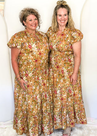 Terracotta with fall florals short sleeve tiered maxi dress.  V-neck and Puff Sleeve and lined. 