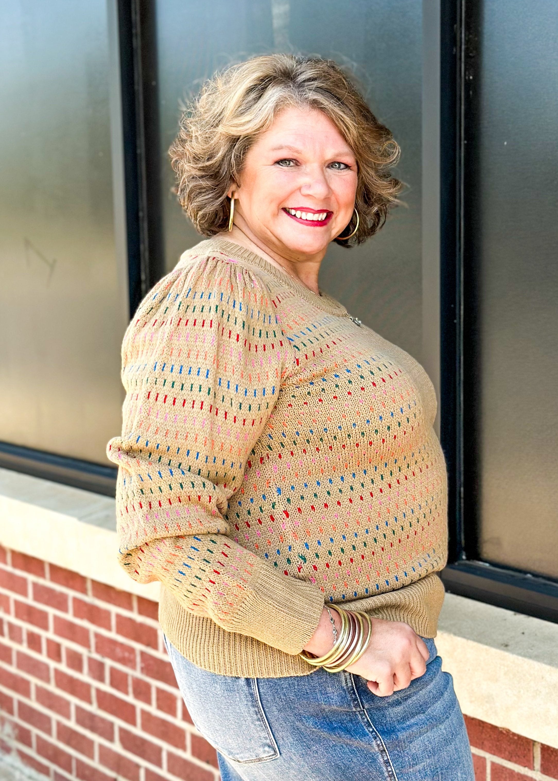 khaki long sleeve sweater with multi color dotted lines