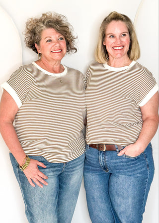 mocha and white striped short sleeve top with white banding on sleeve and collar. 