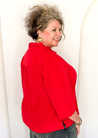 Women's ruffle collar blouse with 3/4 sleeve- in red.