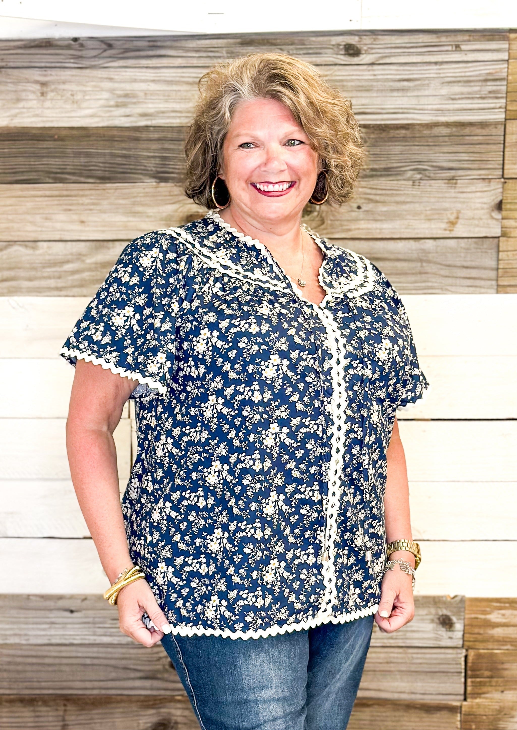 navy floral with hints of blue top - rick rack edging detail - small v-neck top with tie neck