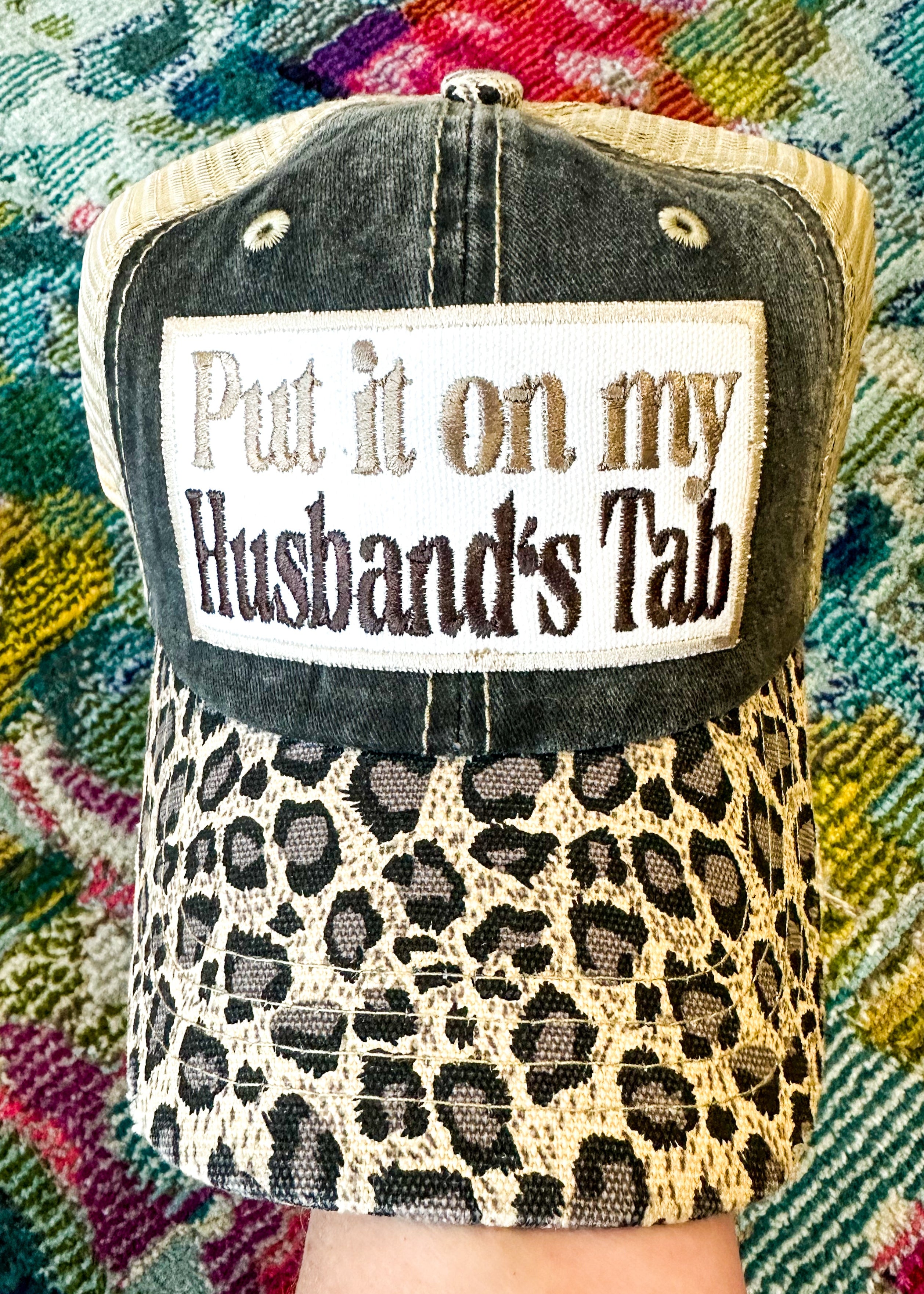 Put it on my Husband's Tab patch in leopard, black and khaki.&nbsp; Leopard bill, black front and khaki mesh back.

Velcro Back.