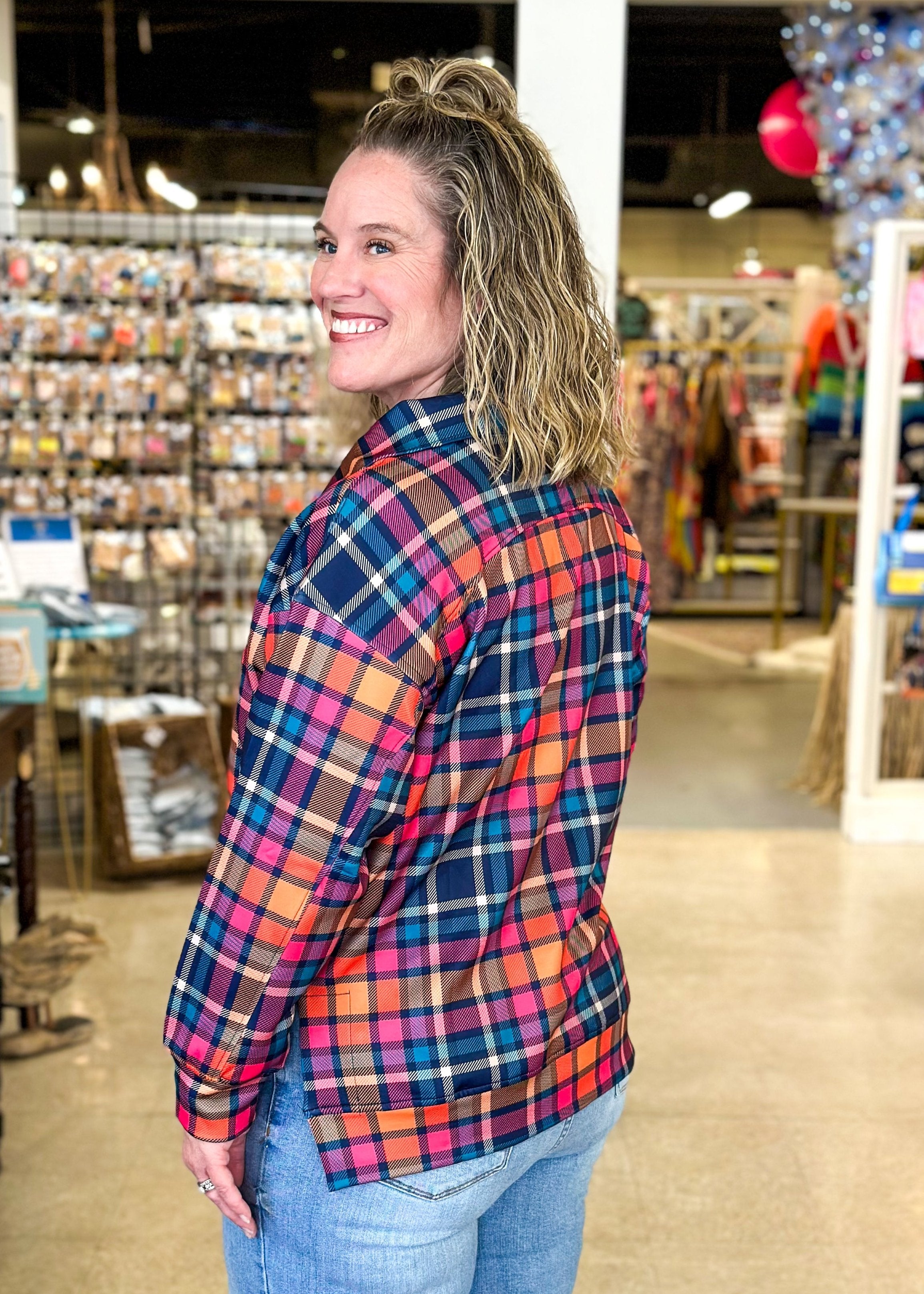 Rainbow colored plaid pullover with high low hem, pockets, ¾ zip neck – long sleeve