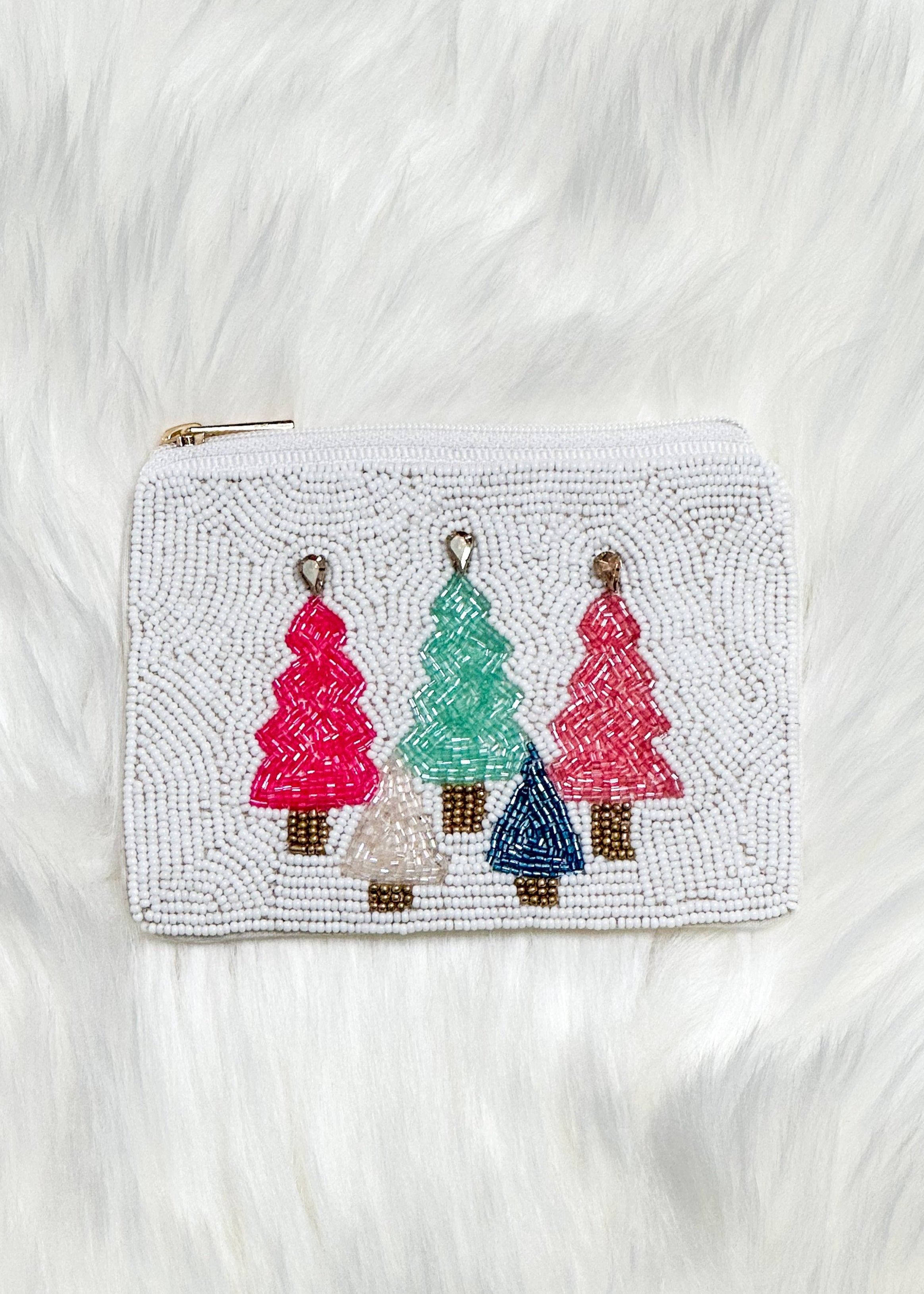 white seed bead coin purse with 5 different colored christmas trees on the front