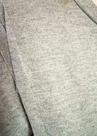 round neck oversized loose fit long sleeve with band cut edge detail with slits. 
