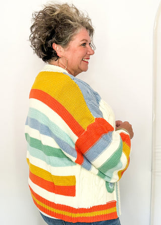 side view of woman modeling a colorful sweater cardigan