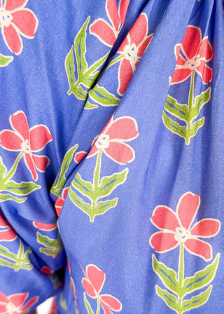 periwinkle floral top with puff short sleeves and v-neck