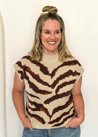 tiger striped short sleeve sweater with oatmeal background
