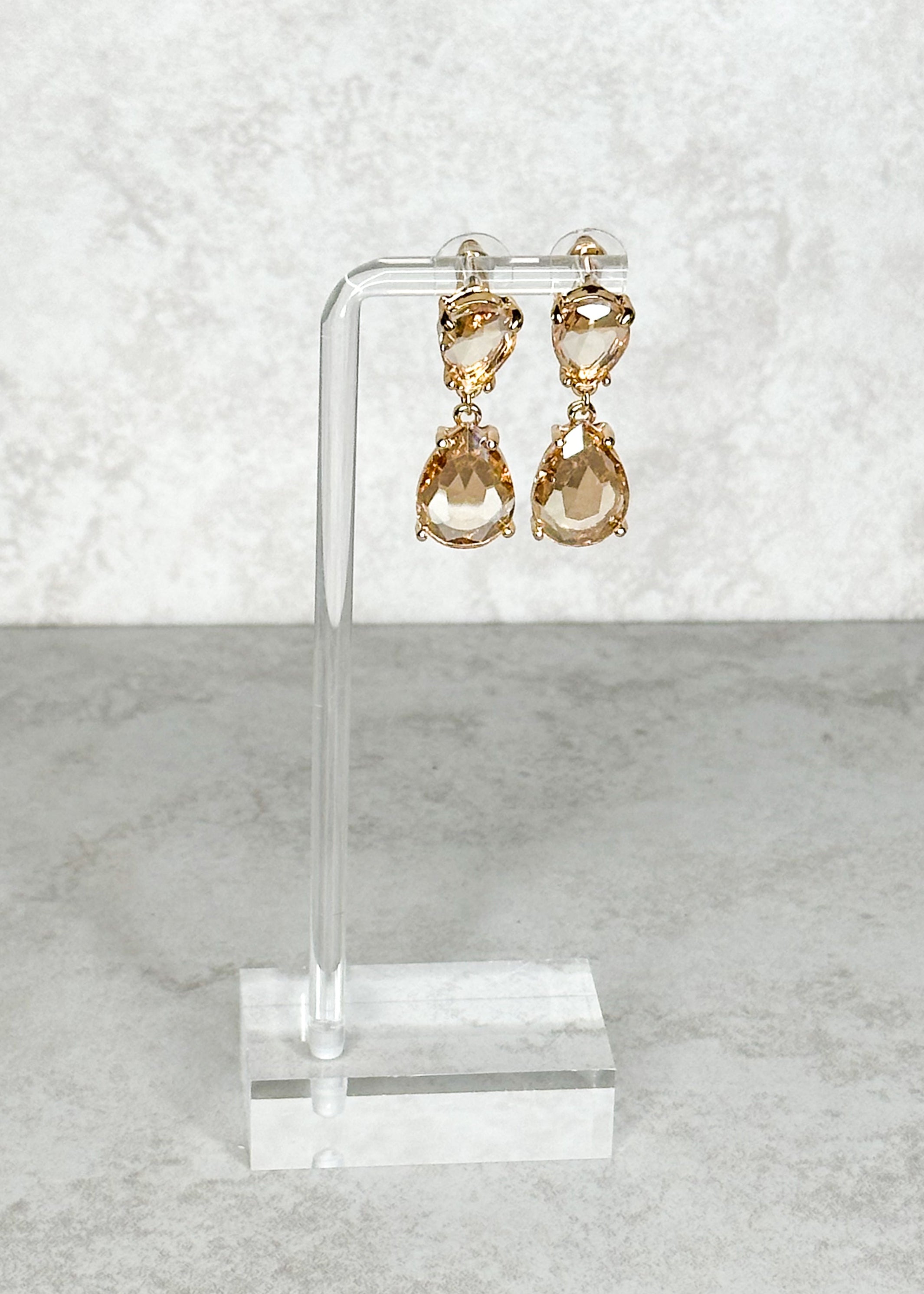 Two tier champagne color with gold hardware post back earrings.