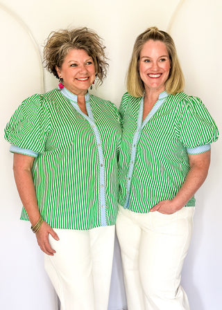 Striped button-down top with V-neckline, short puff sleeves, and contrast trim detailing