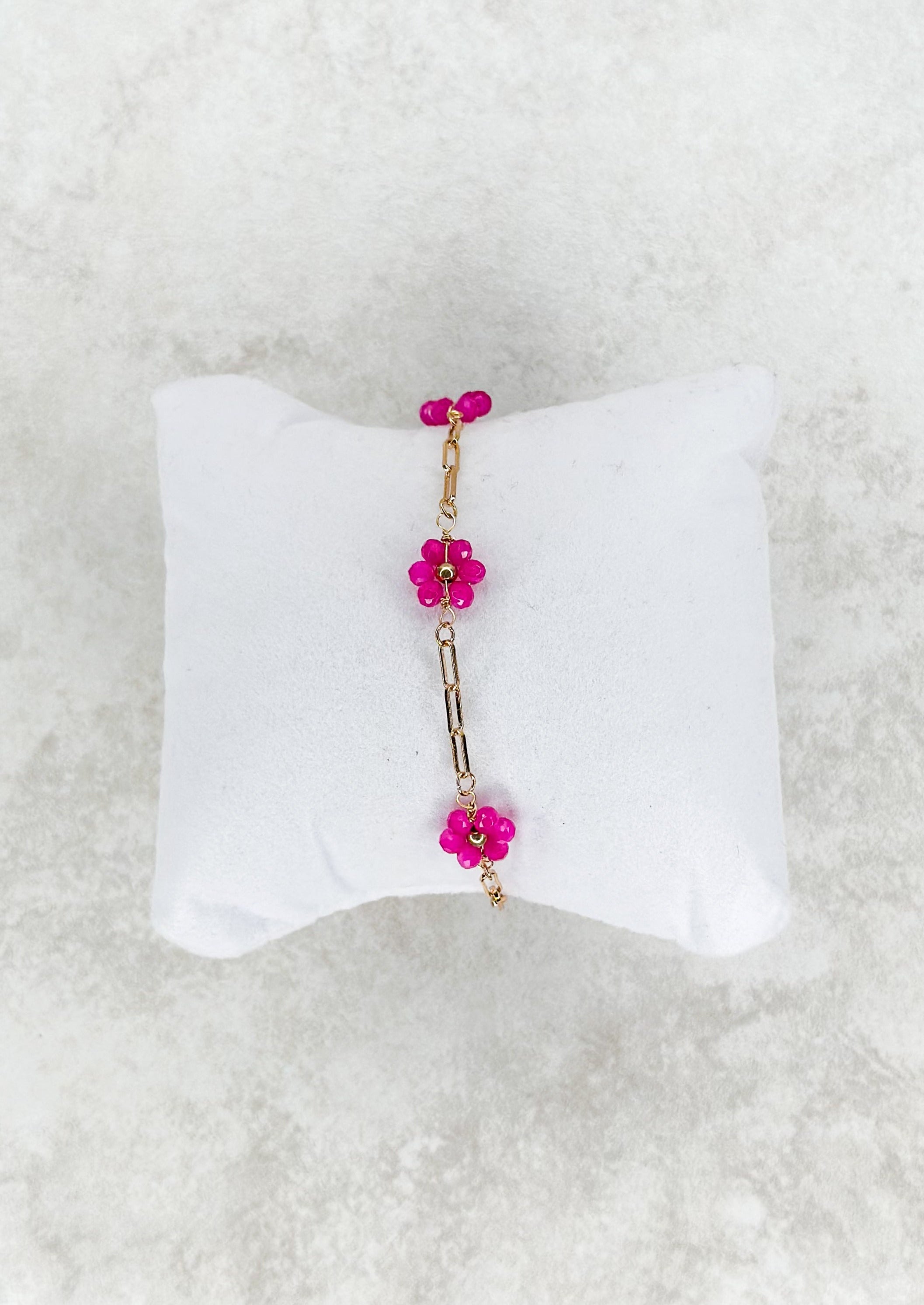 Gold single strand chain bracelet with colored beaded flower. - fuschia