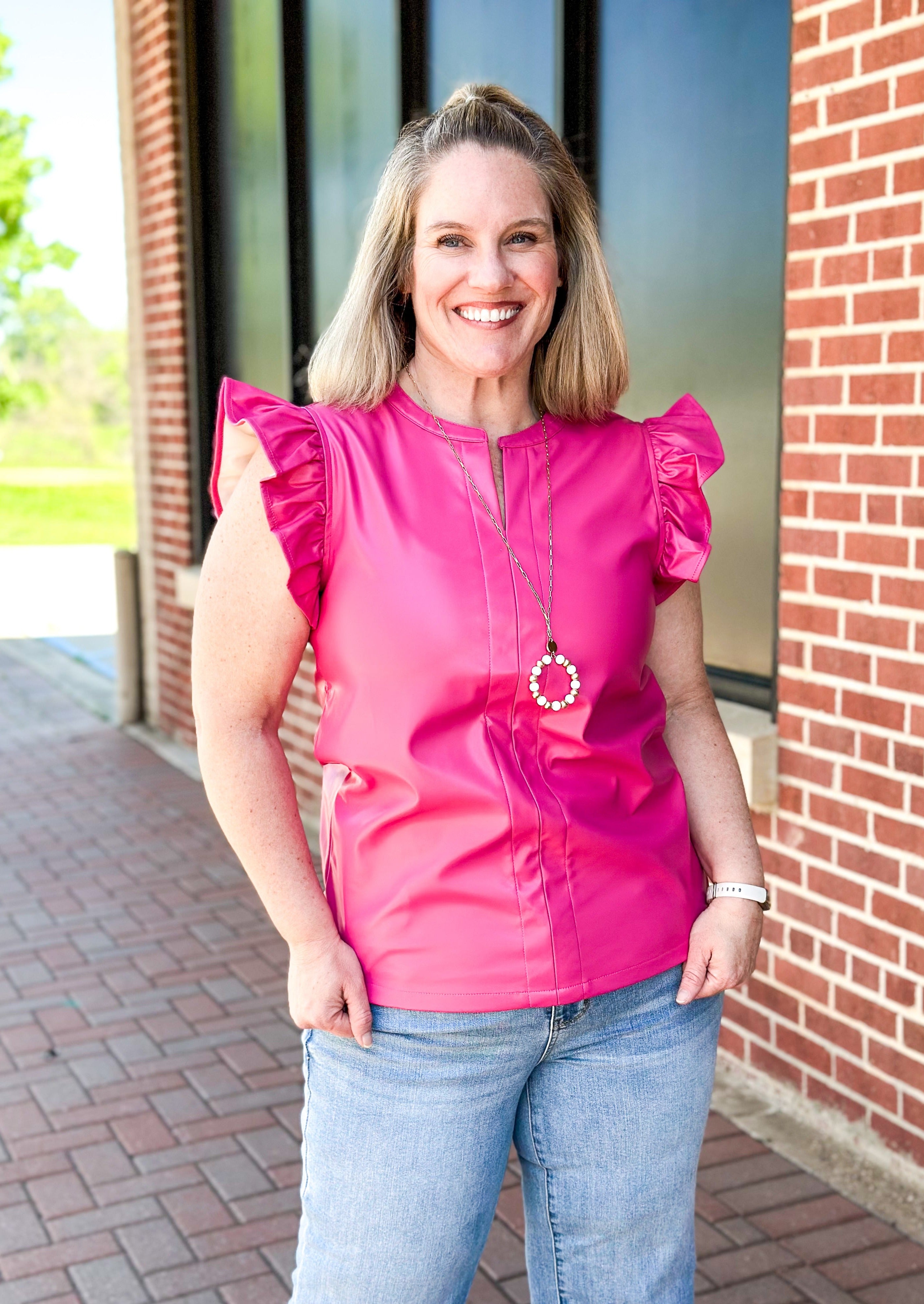 faux leather top with ruffle sleeve and v-neck