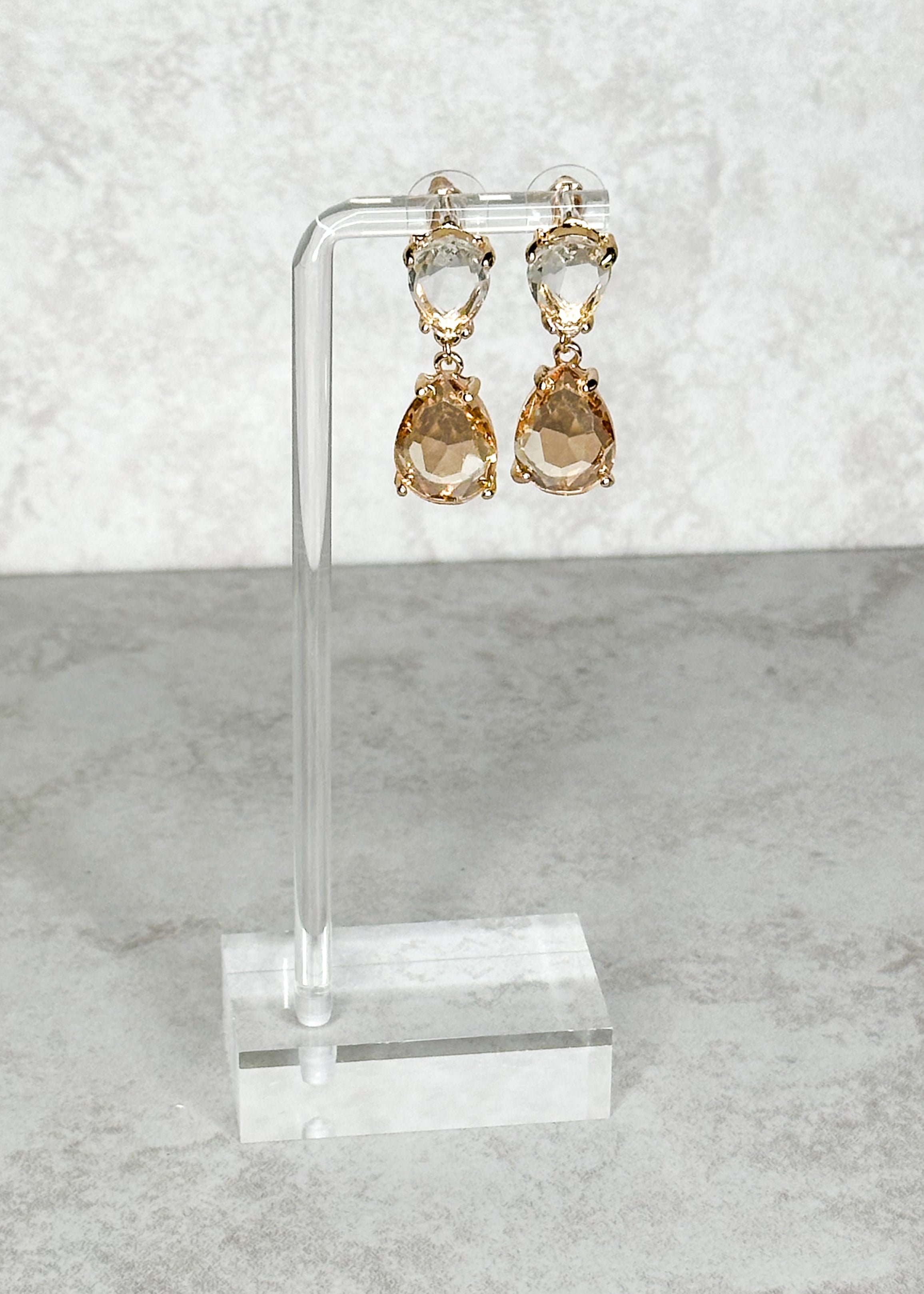 Two tier clear and champagne with gold hardware post back earrings.