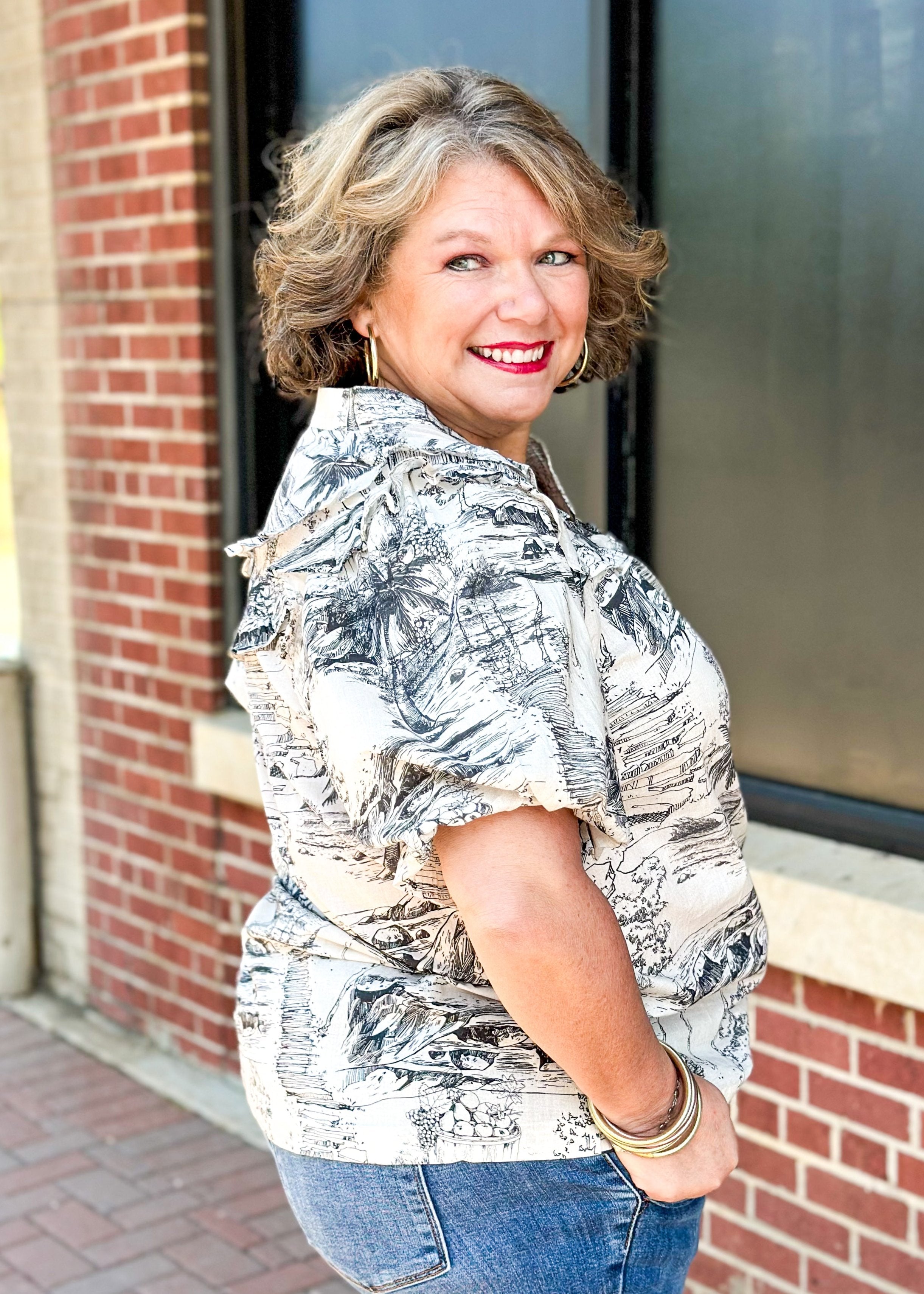 black and cream toile top with ruffle shoulder and short sleeves