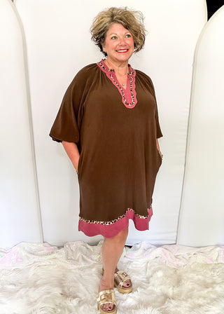 Brown ribbed v-neck dress with pink scallop trim and leopard print contrast. 