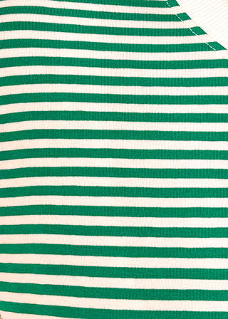 Close up of green and white striped short sleeve top with white banding on sleeve and collar. 