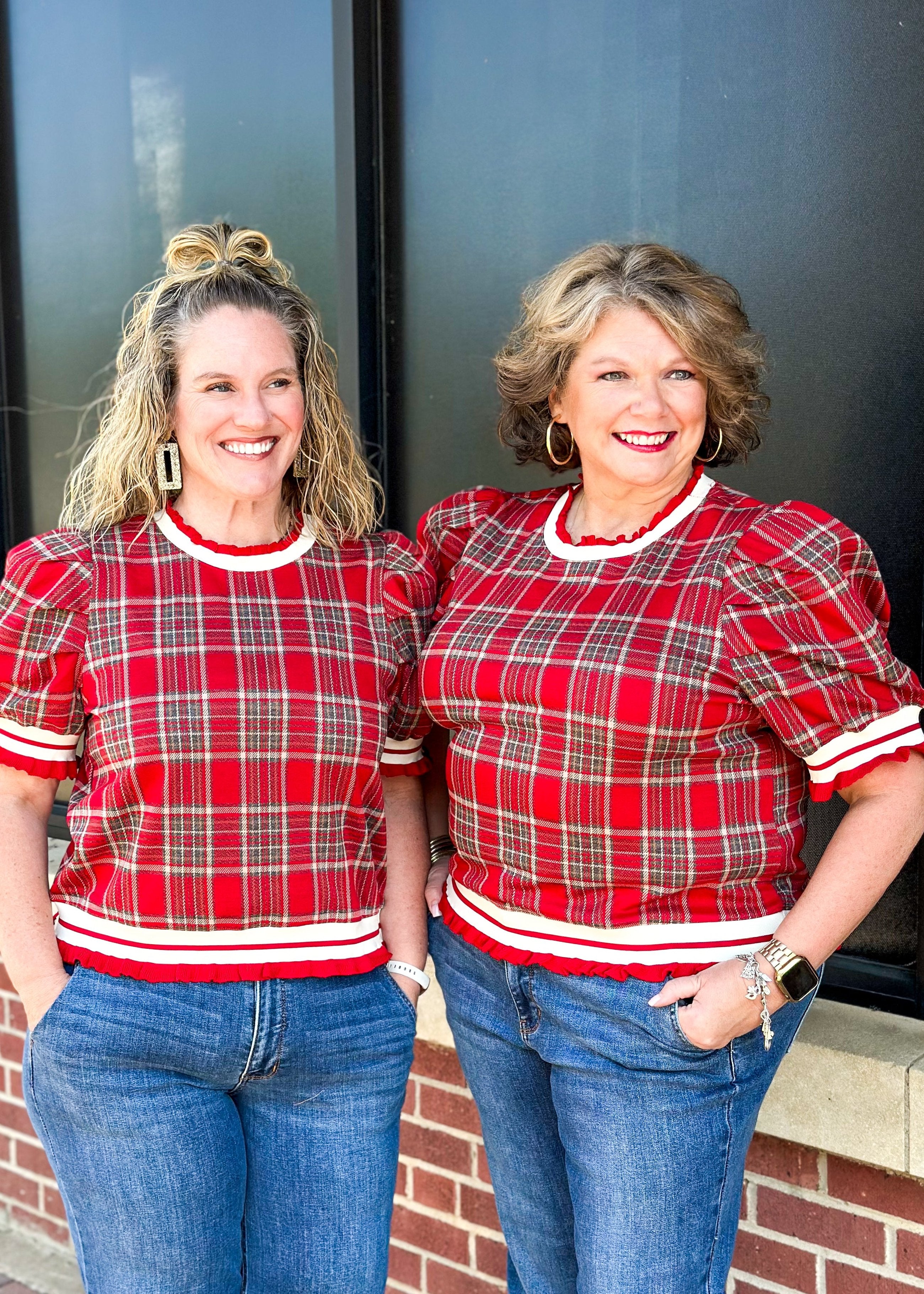 red, cream, gray plaid short puff sleeve sweater - cream trim around bottom, sleeves and collar with red ruffle