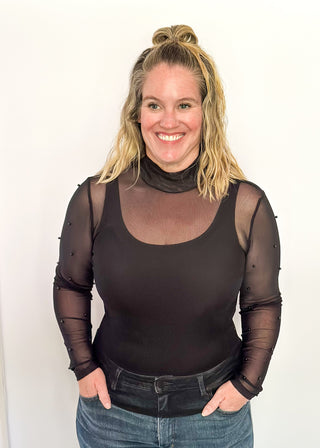 Mock neck mesh black top with black beaded sleeves.