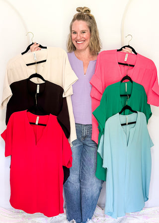 Solid textured blouse with a V-notch neckline, short sleeves in all color ways
