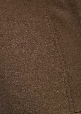 Black scuba athleisure top with gold zip neckline and relaxed fit