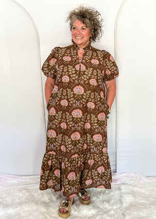 women wearing brown midi dress with floral pattern