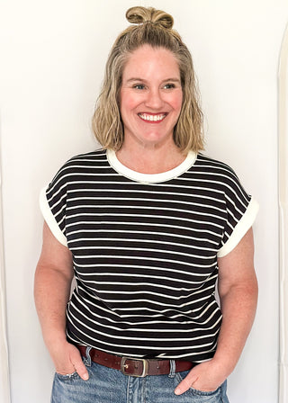 wide striped top with cuffed sleeves, and white banded rounded neckline.