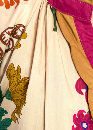 Camel background midi dress with multicolor floral design and long sleeves