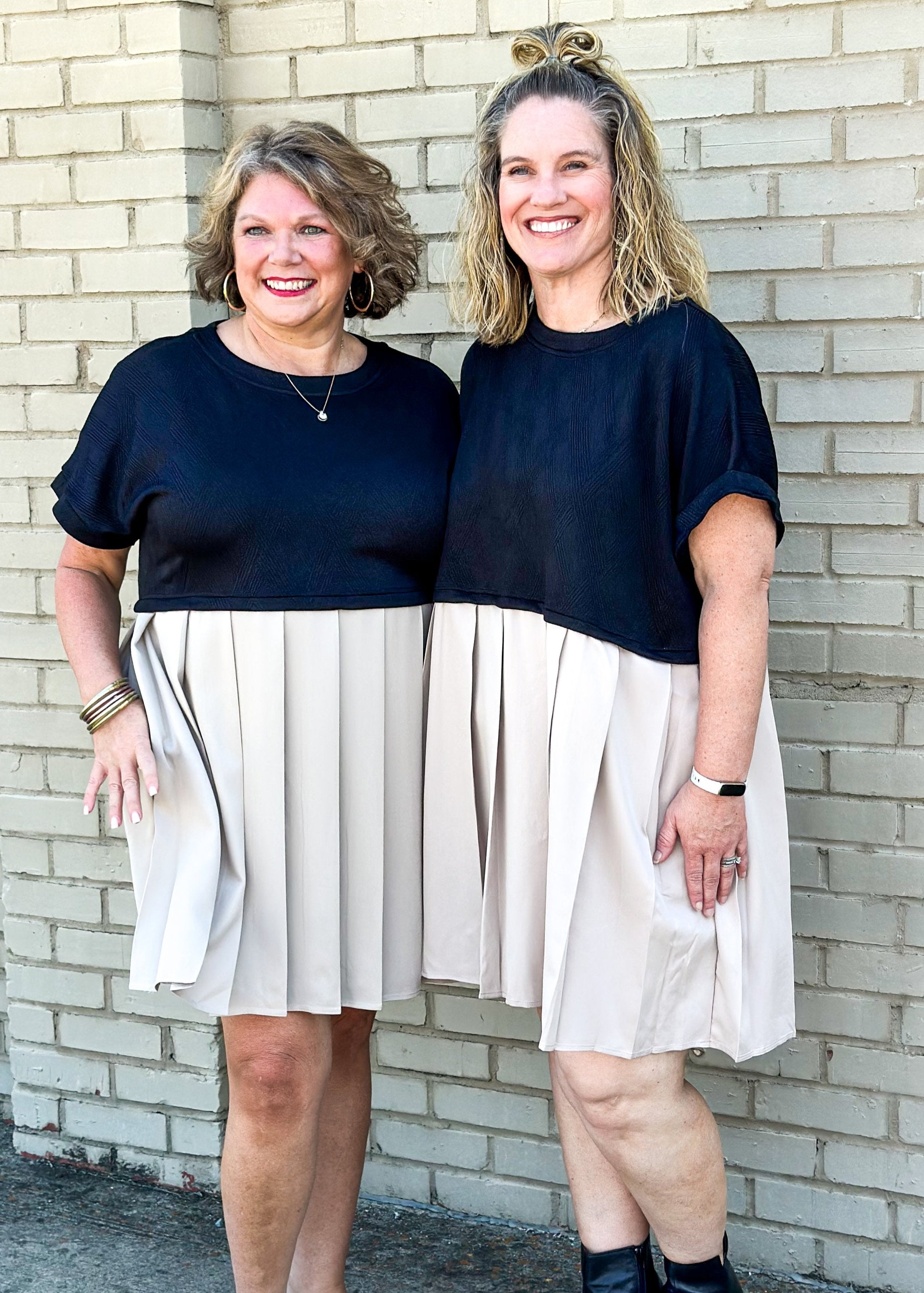 mixed material pleated dress w/pockets - textured short sleeve black on the top and light tan pleated bottom