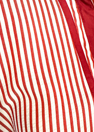 Close up of brick and cream striped Dolman top.