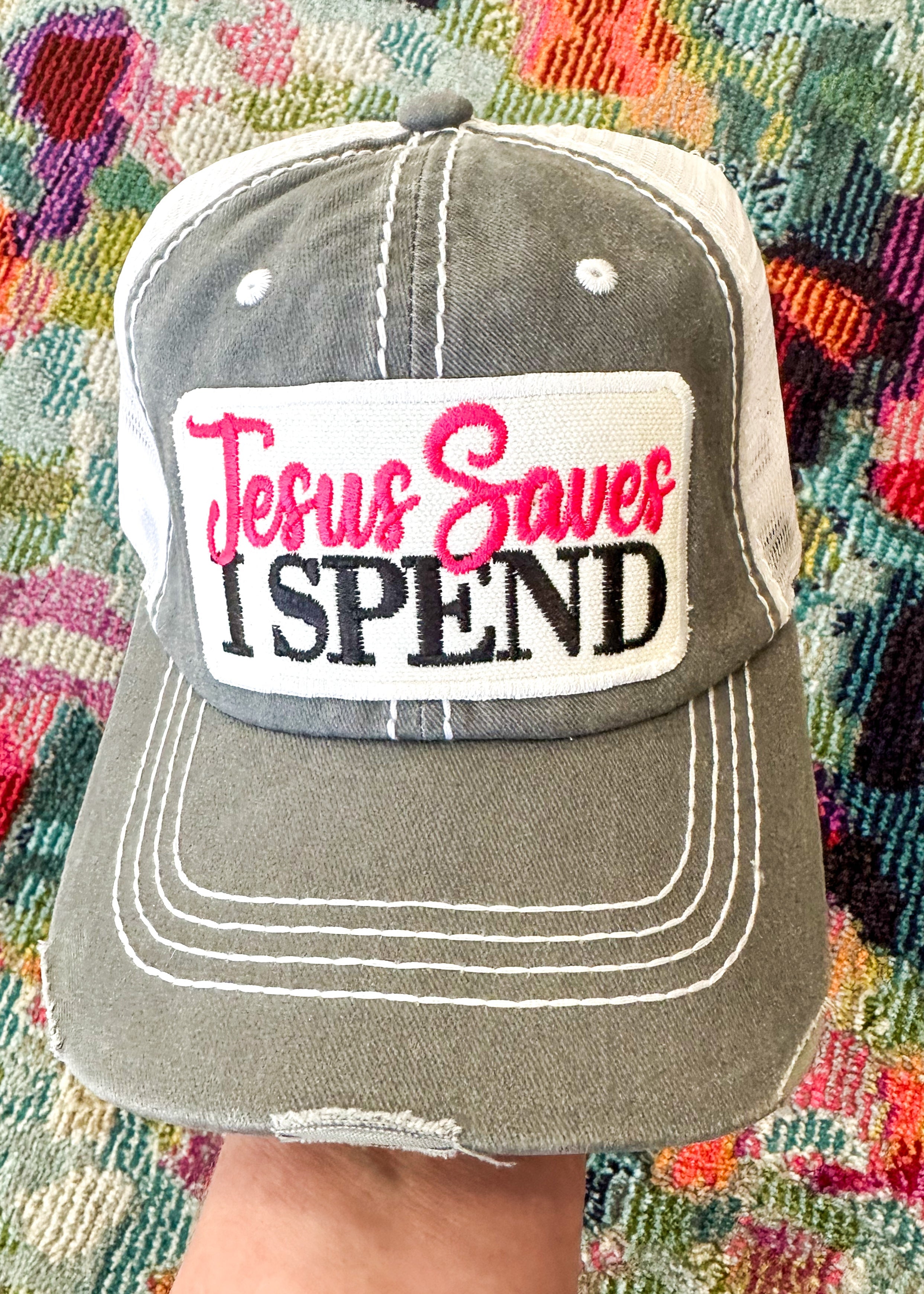 Embroidered Jesus Saves and I Spend patch on a retro style gray baseball hat with white mesh back.

Velcro closure.