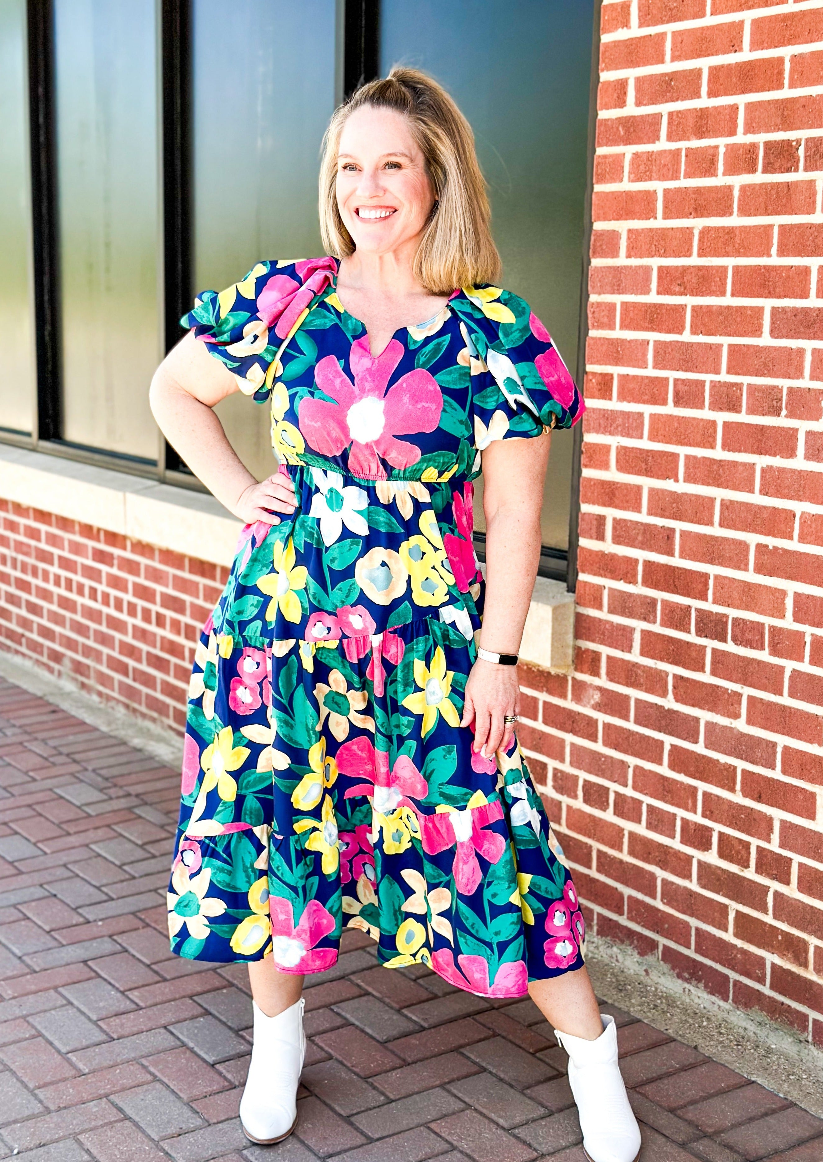 bright floral on a navy background angled tiered midi dress - puff sleeve