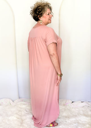 Casual ultra soft maxi dress with relaxed silhouette and pockets.