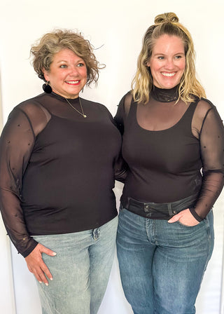 Mock neck mesh black top with black beaded sleeves.