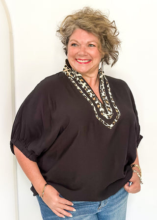 black dolman short sleeve with double leopard stripe v-neck