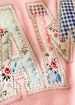 Close up of pink patchwork Mama Rhinestone tee