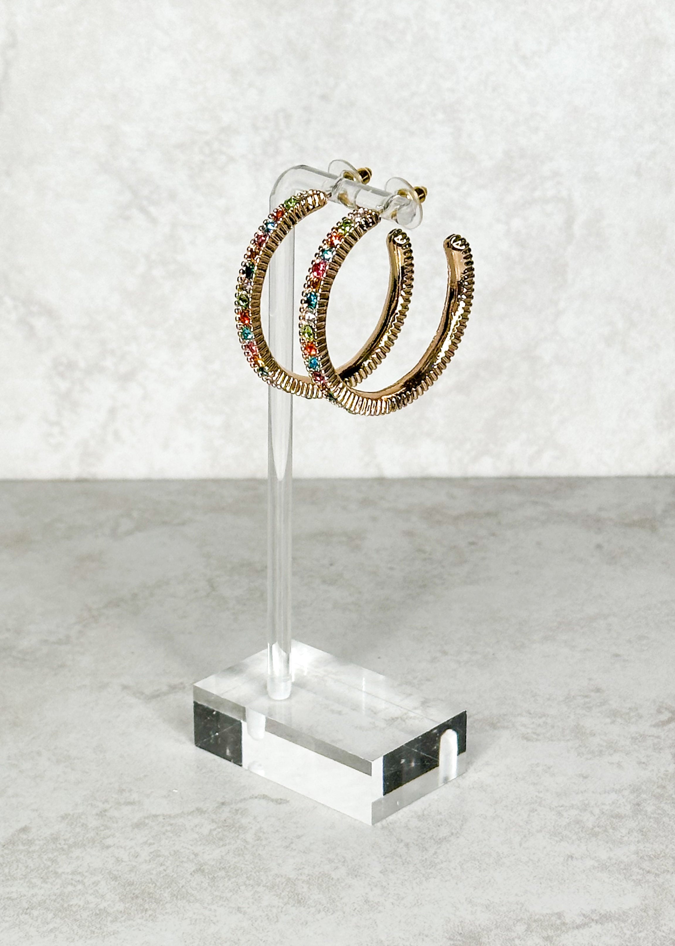 Multi-colored stones with gold colored hardware post back earrings.