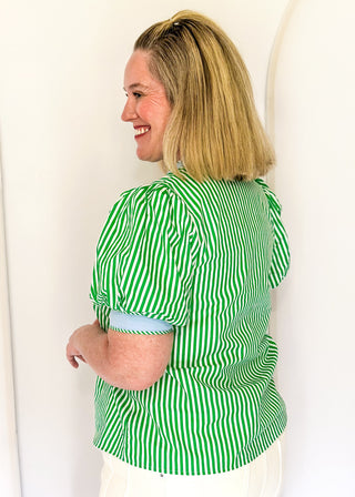 Striped button-down top with V-neckline, short puff sleeves, and contrast trim detailing