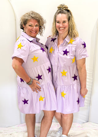 Short sleeve above the knee button up tiered dress. Purple and gold chenille patches with light purple fabric, collared.