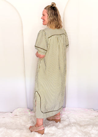Vertical Stripe Dress in a relaxed silhouette with collar, solid olive contrast detail and pockets.