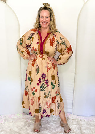 Camel background midi dress with multicolor floral design and long sleeves