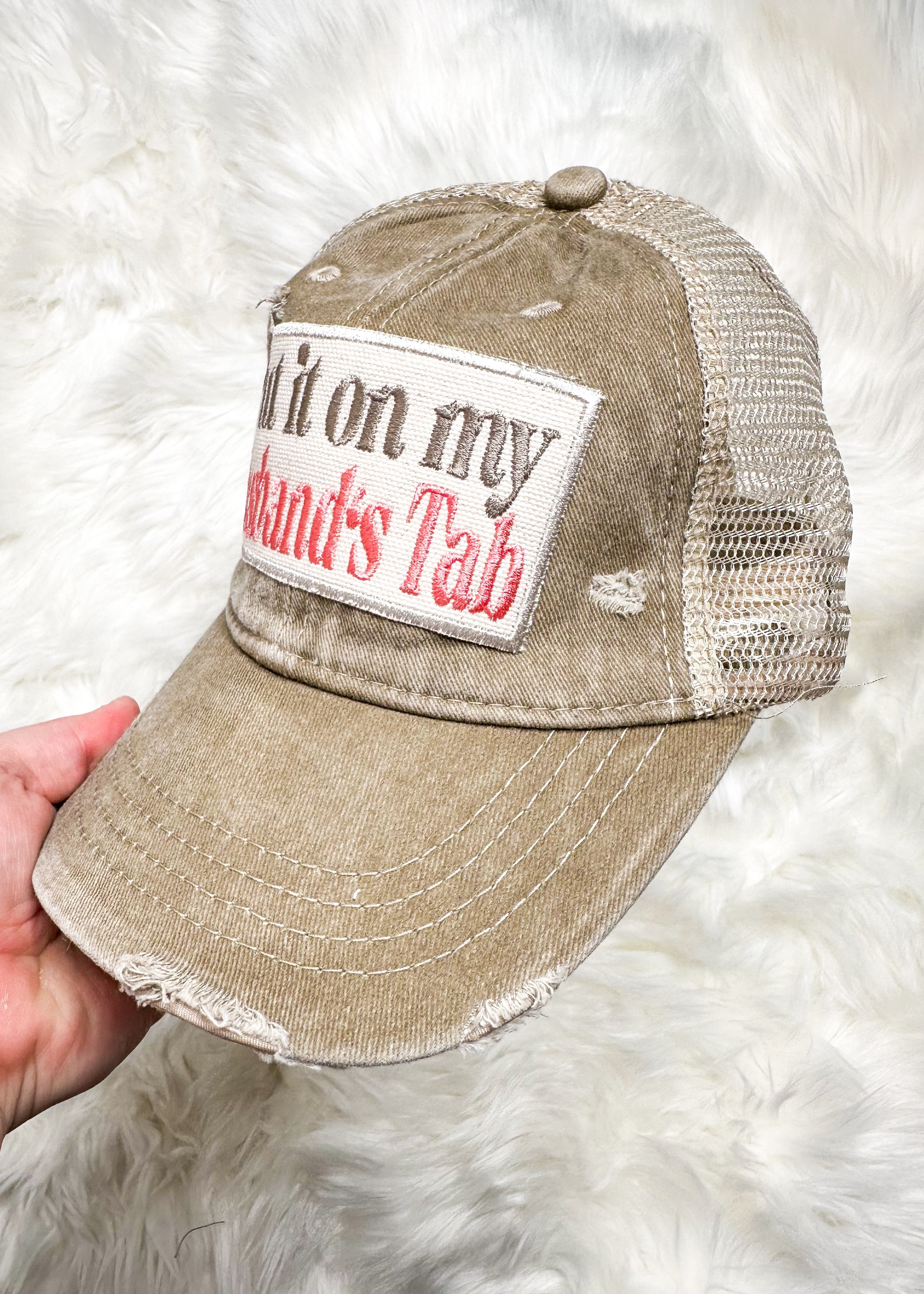 khaki snap back trucker hat - neutral and pink put it on my husband's tab embroidered patch on the front