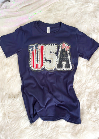 Navy short sleeve tee with USA graphic an rhinestone detail.