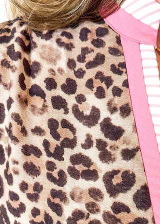 tiered leopard print dress with pink and white striped along collar and down the v-neck front and trimmed on the 2 tiers of the bottom portion of the dress - pockets