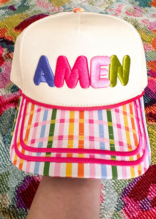 snap back hat with bright colored stripes on bill with AMEN embroidered on the front. 