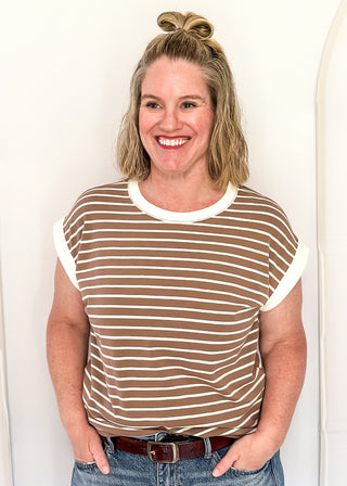 wide striped top with cuffed sleeves, and white banded rounded neckline.