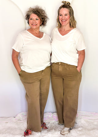 Judy Blue light brown wide-leg crop jeans featuring a high-rise waist, relaxed fit, and ankle-length hem.