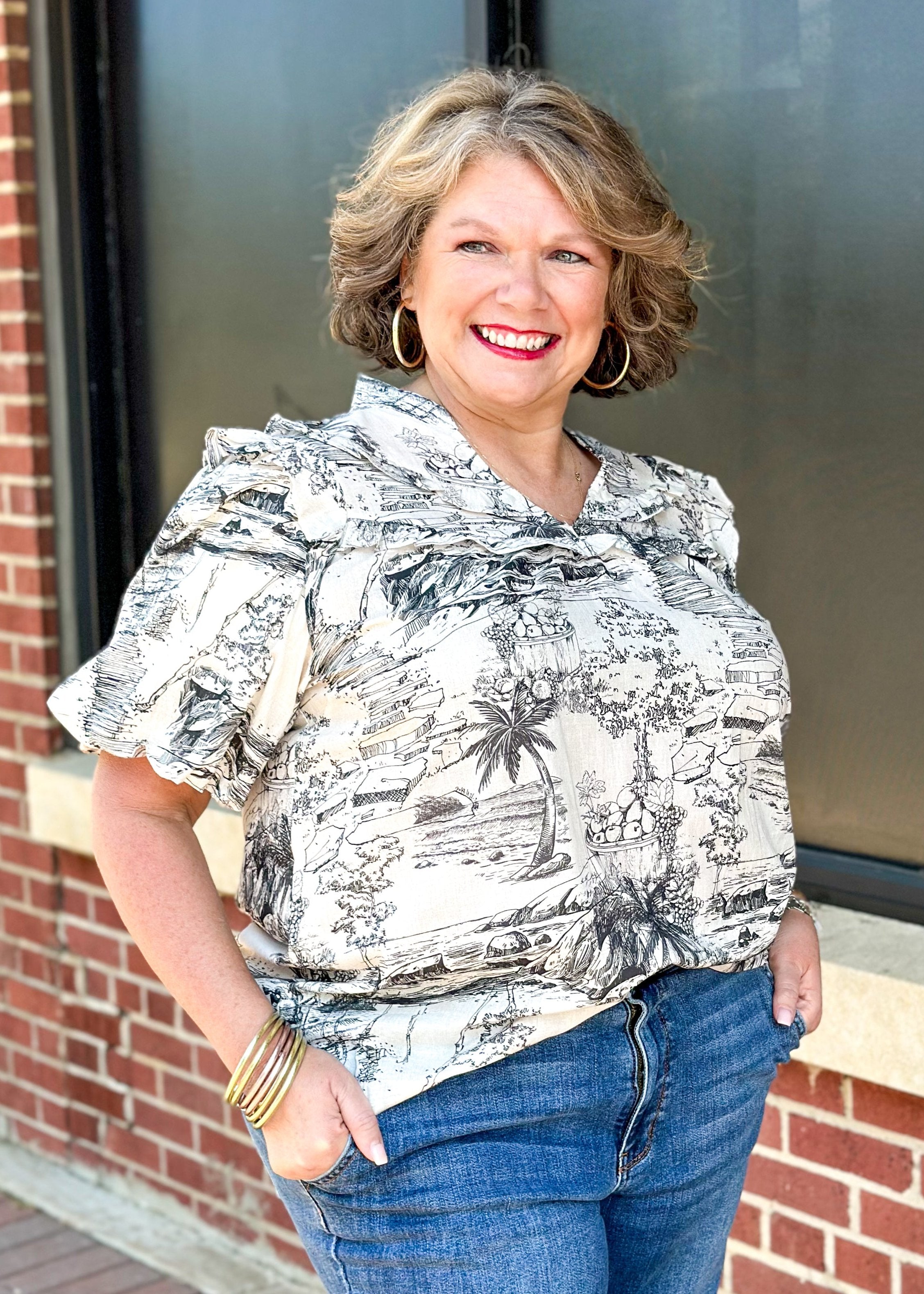 black and cream toile top with ruffle shoulder and short sleeves