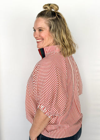 Short sleeve vertical brick red stripes with V-neck ribbon collar.