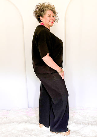 Two piece ribbed outfit in Black featuring boxy top and wide leg pants