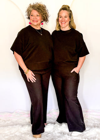 Two piece ribbed outfit in Black featuring boxy top and wide leg pants